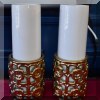 D06. Pair of goldtone candle stands with flameless candles. 
